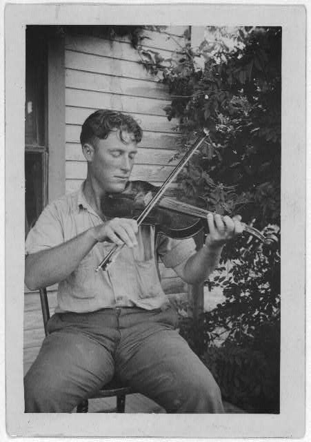 Wayne Perry playing fiddle, Crowley, Louisiana.